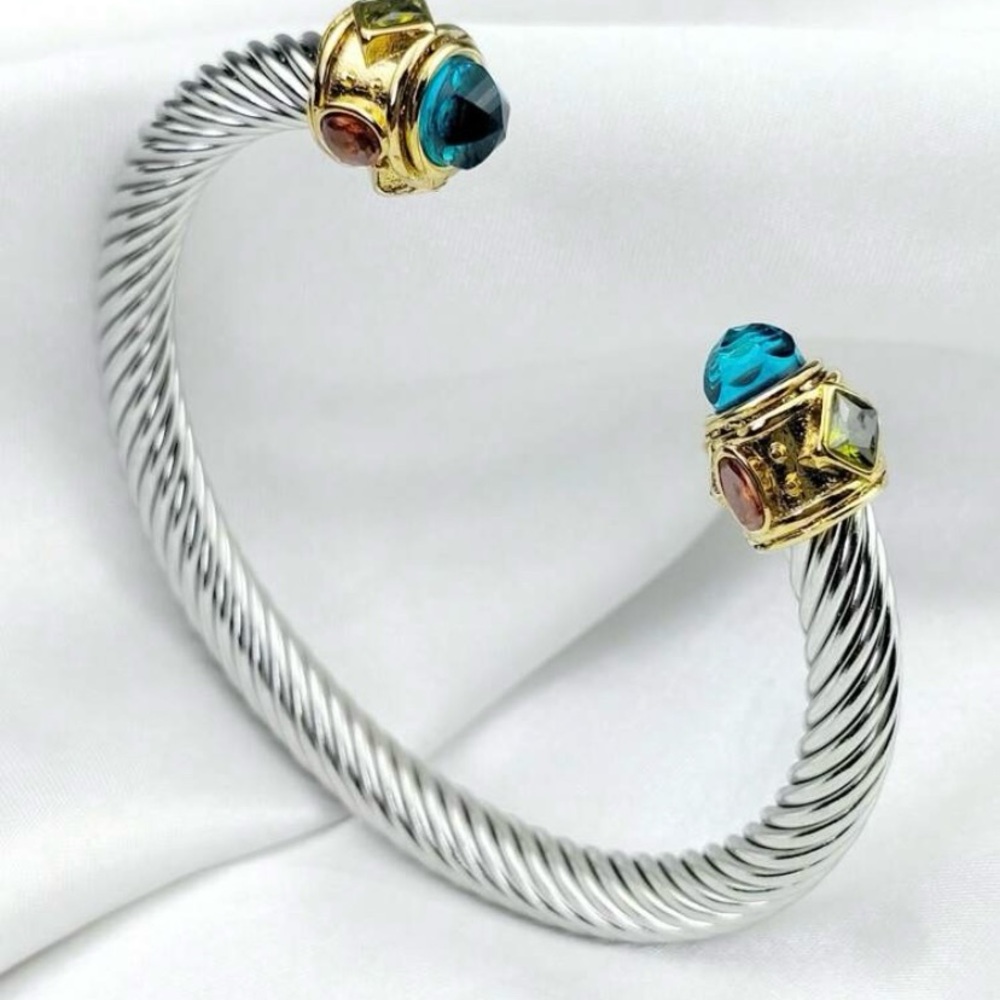 Elegant Silver and Gold Bracelet with Blue Accents